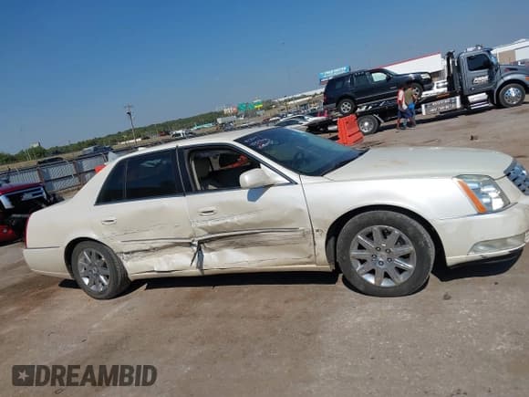 ✅ 2009 Cadillac DTS 1SA • VIN: 1G6KD57Y09U115406 • Lot: 43469527. Wystawiony na IAAI z przebiegiem 165 258 mil. Bezpłatny archiwum sprzedaży aukcyjnych z USA i szczegółowy raport historii pojazdu na DreamBid. Zdjęcie 13.