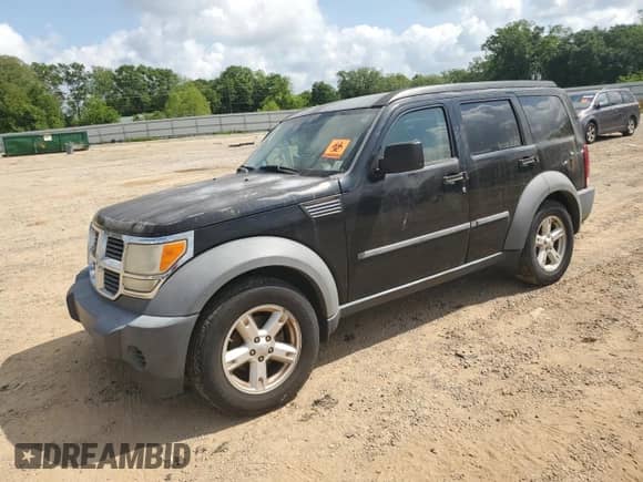 2007 Dodge Nitro SXT with VIN 1D8GT28K87W689785, listed as a Copart auction lot 57440304 with 171,738 mi miles and Salvage title. Bid and sale history available at DreamBid. Image 1.