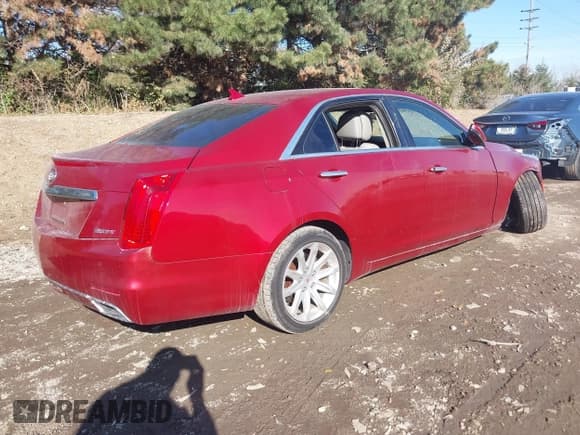 ✅ 2014 Cadillac CTS AWD • VIN: 1G6AW5SX4E0149936 • Lot: 43703151. Listed on IAAI with 108,671 mi. Free auction sales archive from the USA and detailed vehicle history report at DreamBid. Image 4.