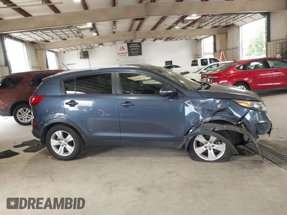 ✅ 2012 Kia Sportage LX • VIN: KNDPB3A25C7330111 • Лот: 42873656. Опубликован ранее на IAAI с пробегом 146 183 миль. Бесплатный доступ к архиву аукционных продаж из США и подробный отчёт об истории автомобиля на DreamBid. Изображение 13.