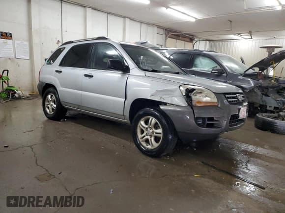 ✅ 2008 Kia Sportage LX • VIN: KNDJF723987458738 • Lot: 83374444. Listed on Copart with 256,396 mi. Free auction sales archive from the USA and detailed vehicle history report at DreamBid. Image 4.