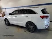 ✅ 2018 Kia Sorento SX • VIN: 5XYPK4A52JG410885 • Лот: 82616515. Опубликован ранее на Copart с пробегом 242 263 миль. Бесплатный доступ к архиву аукционных продаж из США и подробный отчёт об истории автомобиля на DreamBid. Изображение 2.