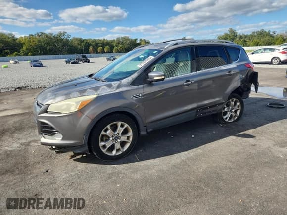 ✅ 2014 Ford Escape Titanium • VIN: 1FMCU0J99EUA85771 • Lot: 91504045. Listed on Copart with 131,245 mi. Free auction sales archive from the USA and detailed vehicle history report at DreamBid. Image 1.