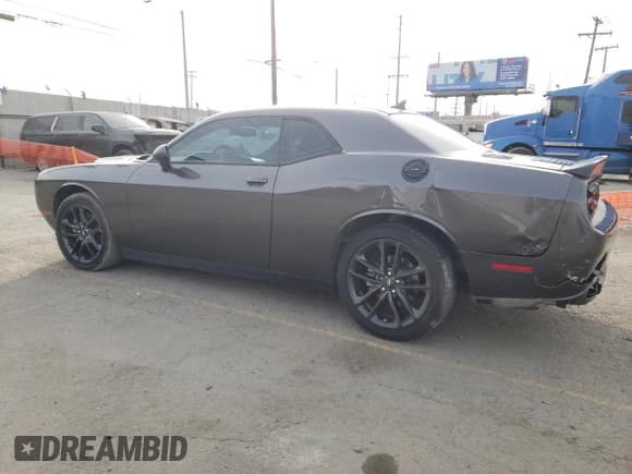 ✅ 2022 Dodge Challenger SXT • VIN: 2C3CDZGGXNH156756 • Lot: 78915354. Wystawiony na Copart z przebiegiem 43 704 mil. Bezpłatny archiwum sprzedaży aukcyjnych z USA i szczegółowy raport historii pojazdu na DreamBid. Zdjęcie 2.