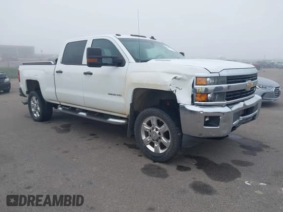 ✅ 2015 Chevrolet Silverado 2500HD LT • VIN: 1GC1KVE84FF170975 • Lot: 43166213. Listed on IAAI with 197,747 mi. Free auction sales archive from the USA and detailed vehicle history report at DreamBid. Image 1.