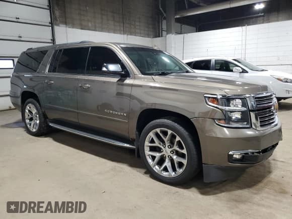 ✅ 2015 Chevrolet Suburban LTZ • VIN: 1GNSKKKCXFR723694 • Lot: 81478045. Listed on Copart with 218,436 mi. Free auction sales archive from the USA and detailed vehicle history report at DreamBid. Image 4.