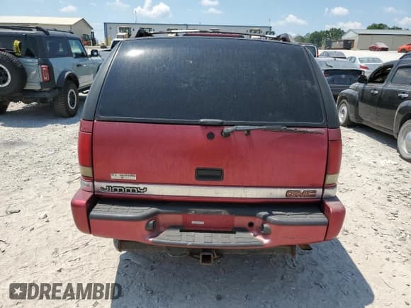 ✅ 2000 GMC Jimmy SLE Convenience • VIN: 1GKDT13W1Y2400913 • Lot: 62079865. Wystawiony na Copart z przebiegiem Nie podano. Bezpłatny archiwum sprzedaży aukcyjnych z USA i szczegółowy raport historii pojazdu na DreamBid. Zdjęcie 6.