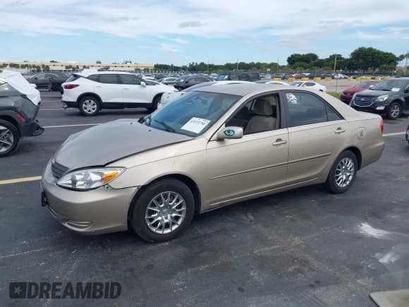 ✅ 2002 Toyota Camry LE • VIN: JTDBE32K320006078 • Lot: 43573730. Wystawiony na IAAI z przebiegiem 207 632 mil. Bezpłatny archiwum sprzedaży aukcyjnych z USA i szczegółowy raport historii pojazdu na DreamBid. Zdjęcie 17.
