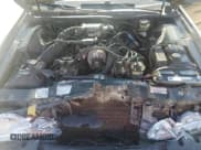 ✅ 1997 Ford Thunderbird LX • VIN: 1FALP62W2VH115047 • Lot: 61364635. Listed on Copart with 57,909 mi. Free auction sales archive from the USA and detailed vehicle history report at DreamBid. Image 11.