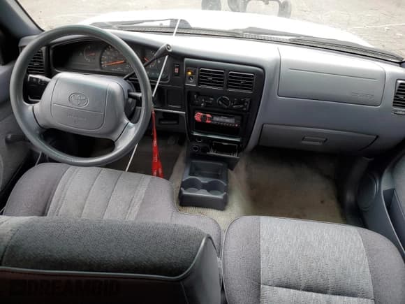 ✅ 1999 Toyota Tacoma • VIN: 4TAVL52N0XZ570861 • Lot: 80557875. Listed on Copart with 274,648 mi. Free auction sales archive from the USA and detailed vehicle history report at DreamBid. Image 8.