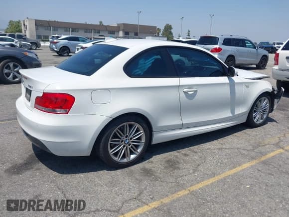 ✅ 2012 BMW 1 Series 128i • VIN: WBAUP7C50CVP24059 • Лот: 42455628. Опубликован ранее на IAAI с пробегом 145 750 миль. Бесплатный доступ к архиву аукционных продаж из США и подробный отчёт об истории автомобиля на DreamBid. Изображение 4.