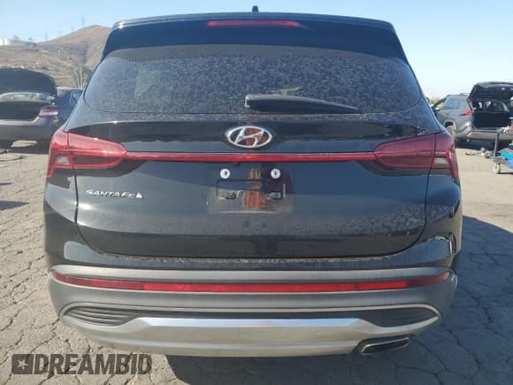✅ 2021 Hyundai Santa Fe SEL • VIN: 5NMS24AJ1MH334223 • Lot: 89676665. Listed on Copart with 33,629 mi. Free auction sales archive from the USA and detailed vehicle history report at DreamBid. Image 6.