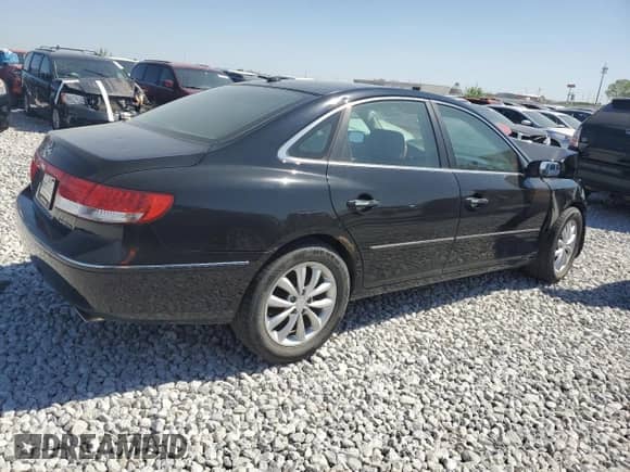 2007 Hyundai Azera SE с VIN KMHFC46F07A244428, выставлен на аукционе Copart как лот 80260304 с пробегом Не указан миль и Списание • Salvage title. История ставок и продаж доступна на DreamBid. Изображение 3.