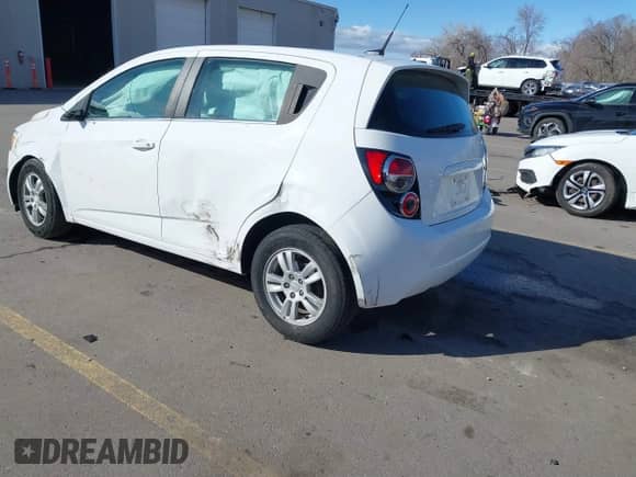 2013 Chevrolet Sonic LT with VIN 1G1JD6SB7D4191708, listed as a IAAI auction lot 41742864 with 188,170 mi miles and . Bid and sale history available at DreamBid. Image 3.
