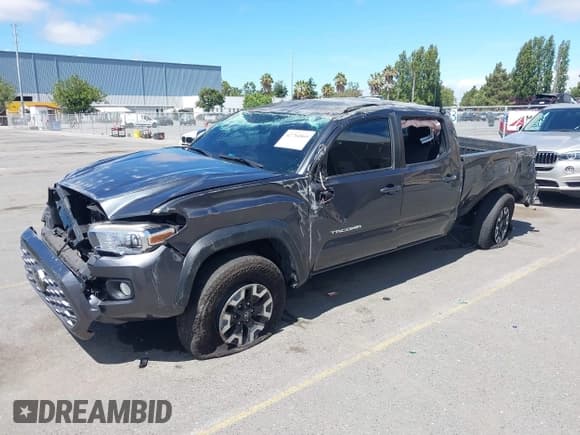 ✅ 2023 Toyota Tacoma SR5 • VIN: 3TMDZ5BN5PM154398 • Lot: 42784865. Listed on IAAI with 45,490 mi. Free auction sales archive from the USA and detailed vehicle history report at DreamBid. Image 2.