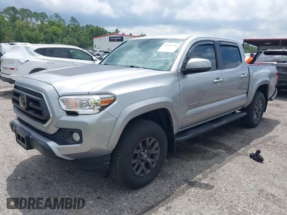 ✅ 2021 Toyota Tacoma SR5 • VIN: 3TYAZ5CN0MT003244 • Lot: 42942708. Listed on IAAI with 55,848 mi. Free auction sales archive from the USA and detailed vehicle history report at DreamBid. Image 2.