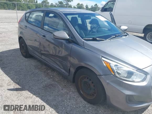 2015 Hyundai Accent GS with VIN KMHCT5AE6FU218002, listed as a IAAI auction lot 43408428 with 164,026 mi miles and . Bid and sale history available at DreamBid. Image 6.