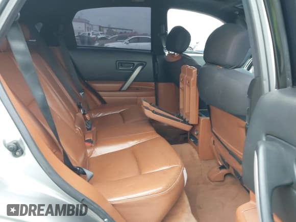 ✅ 2003 Infiniti FX Options • VIN: JNRBS08W33X402022 • Lot: 42047472. Listed on IAAI with 203,438 mi. Free auction sales archive from the USA and detailed vehicle history report at DreamBid. Image 8.