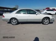 ✅ 2000 Lexus ES 300 • VIN: JT8BF28G4Y5102497 • Лот: 43650282. Опубликован ранее на IAAI с пробегом 128 348 миль. Бесплатный доступ к архиву аукционных продаж из США и подробный отчёт об истории автомобиля на DreamBid. Изображение 13.