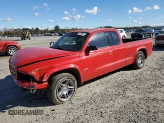 2000 Dodge Dakota Sport with VIN 1B7GL22Z1YS589119, listed as a Copart auction lot 81939944 with 144,952 mi miles and Salvage title. Bid and sale history available at DreamBid. Image 1.