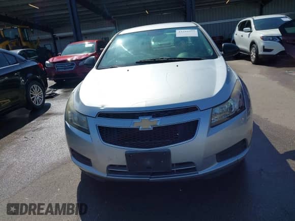 2013 Chevrolet Cruze LS z VIN 1G1PA5SH5D7145164, wystawiony jako IAAI lot #43294377 z przebiegiem 191 872 mil mil oraz . Historia ofert i sprzedaży dostępna na DreamBid. Obrazek 12.