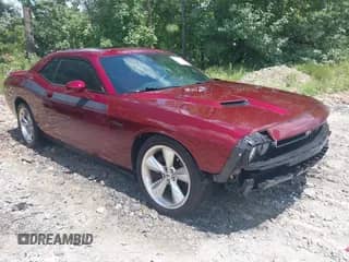 2018 Dodge Challenger R/T z VIN 2C3CDZBT4JH183613, wystawiony jako IAAI lot #42736300 z przebiegiem 176 851 mil mil oraz . Historia ofert i sprzedaży dostępna na DreamBid. Obrazek 1.