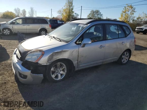 ✅ 2008 Kia Rondo EX • VIN: KNAFG526787190061 • Лот: 90371065. Опубликован ранее на Copart с пробегом 165 547 миль. Бесплатный доступ к архиву аукционных продаж из США и подробный отчёт об истории автомобиля на DreamBid. Изображение 1.