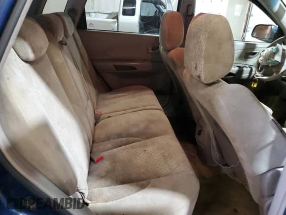 2005 Hyundai Tucson GLS z VIN KM8JN12D35U072088, wystawiony jako Copart lot #65343044 z przebiegiem 191 437 mil mil oraz Szkoda całkowita • Salvage title. Historia ofert i sprzedaży dostępna na DreamBid. Obrazek 12.