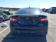 ✅ 2015 Ford Fusion Titanium Hybrid • VIN: 3FA6P0RU4FR214483 • Лот: 42327816. Опубликован ранее на IAAI с пробегом 149 007 миль. Бесплатный доступ к архиву аукционных продаж из США и подробный отчёт об истории автомобиля на DreamBid. Изображение 16.