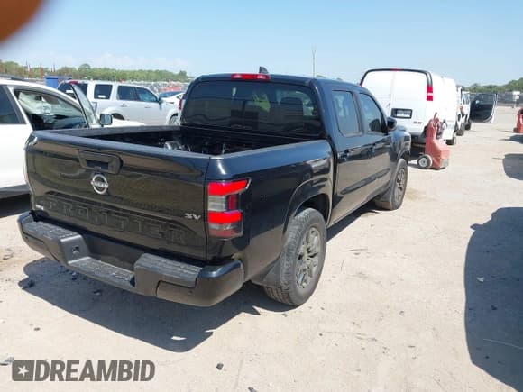 ✅ 2022 Nissan Frontier SV • VIN: 1N6ED1EJ6NN652291 • Lot: 42999564. Listed on IAAI with 65,959 mi. Free auction sales archive from the USA and detailed vehicle history report at DreamBid. Image 4.