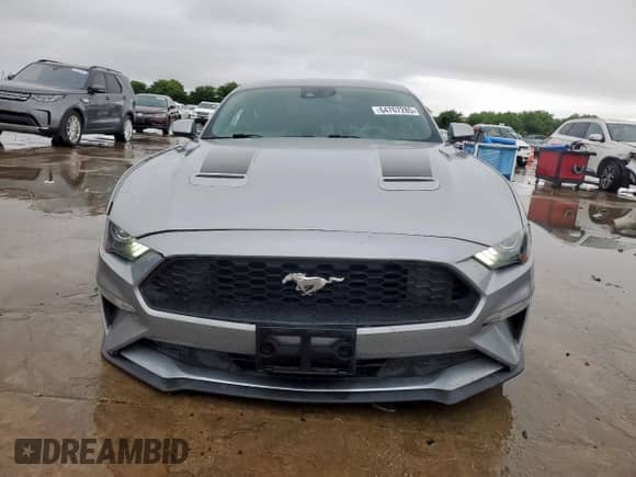 2021 Ford Mustang EcoBoost with VIN 1FA6P8TH7M5137392, listed as a Copart auction lot 64767285 with 100,212 mi miles and Salvage title. Bid and sale history available at DreamBid. Image 5.