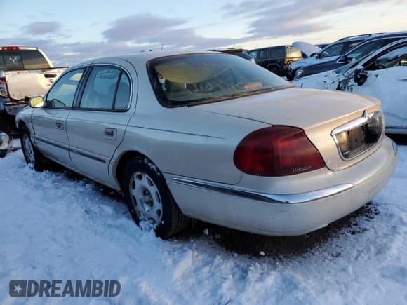 ✅ 2000 Lincoln Continental • VIN: 1LNHM97V6YY900603 • Lot: 85570864. Listed on Copart with 127,668 mi. Free auction sales archive from the USA and detailed vehicle history report at DreamBid. Image 2.