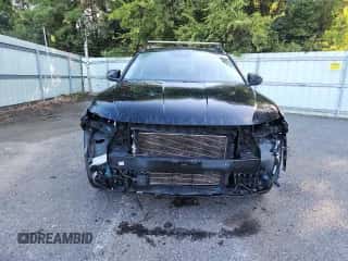 2023 Hyundai Tucson SEL with VIN 5NMJBCAE2PH279827, listed as a Copart auction lot 82166985 with 65,784 mi miles and Salvage title. Bid and sale history available at DreamBid. Image 5.