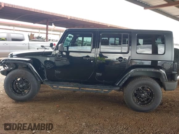 ✅ 2008 Jeep Wrangler Unlimited Sahara • VIN: 1J8GA59128L542384 • Lot: 42184176. Listed on IAAI with 152,768 mi. Free auction sales archive from the USA and detailed vehicle history report at DreamBid. Image 14.