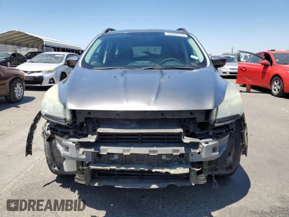 ✅ 2014 Ford Escape SE • VIN: 1FMCU0GX0EUD38384 • Lot: 63342715. Wystawiony na Copart z przebiegiem 121 319 mil. Bezpłatny archiwum sprzedaży aukcyjnych z USA i szczegółowy raport historii pojazdu na DreamBid. Zdjęcie 5.