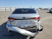 ✅ 2025 Toyota Corolla Hybrid LE • VIN: JTDBCMFE8S3077582 • Lot: 82417905. Listed on Copart with 4,435 mi. Free auction sales archive from the USA and detailed vehicle history report at DreamBid. Image 6.