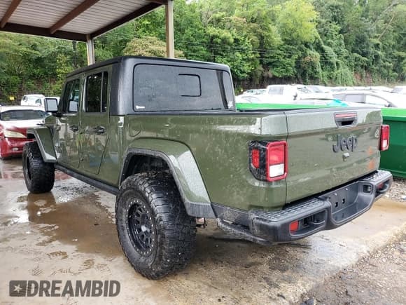 ✅ 2023 Jeep Gladiator Freedom • VIN: 1C6HJTAG6PL517087 • Лот: 61604175. Опубликован ранее на Copart с пробегом 26 213 миль. Бесплатный доступ к архиву аукционных продаж из США и подробный отчёт об истории автомобиля на DreamBid. Изображение 2.