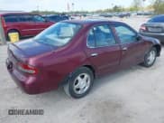 ✅ 1997 Nissan Altima XE • VIN: 1N4BU31D9VC185791 • Lot: 42209165. Listed on IAAI with 90,942 mi. Free auction sales archive from the USA and detailed vehicle history report at DreamBid. Image 4.