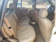 ✅ 2000 Jeep Grand Cherokee Laredo • VIN: 1J4GW48N0YC210235 • Lot: 60558905. Listed on Copart with 131,108 mi. Free auction sales archive from the USA and detailed vehicle history report at DreamBid. Image 11.