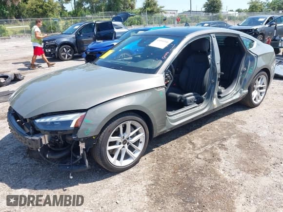 ✅ 2023 Audi A5 Sportback S line Premium Plus • VIN: WAUFACF50PA020715 • Лот: 43094546. Опубликован ранее на IAAI с пробегом 29 513 миль. Бесплатный доступ к архиву аукционных продаж из США и подробный отчёт об истории автомобиля на DreamBid. Изображение 2.