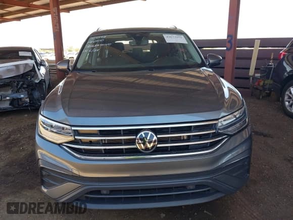 ✅ 2023 Volkswagen Tiguan SE • VIN: 3VVNB7AX1PM117728 • Lot: 42673251. Listed on IAAI with 27,915 mi. Free auction sales archive from the USA and detailed vehicle history report at DreamBid. Image 12.