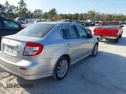 ✅ 2008 Suzuki SX4 Convenience • VIN: JS2YC415X85100378 • Lot: 41904682. Listed on IAAI with 130,164 mi. Free auction sales archive from the USA and detailed vehicle history report at DreamBid. Image 4.