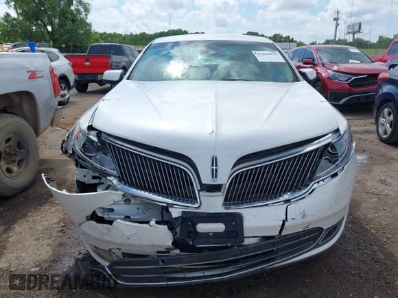 ✅ 2014 Lincoln MKS • VIN: 1LNHL9DK7EG601720 • Lot: 42464979. Listed on IAAI with 58,163 mi. Free auction sales archive from the USA and detailed vehicle history report at DreamBid. Image 12.