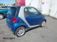 ✅ 2009 Smart fortwo Pure • VIN: WMEEJ31X19K243304 • Лот: 42860139. Опубликован ранее на IAAI с пробегом 119 617 миль. Бесплатный доступ к архиву аукционных продаж из США и подробный отчёт об истории автомобиля на DreamBid. Изображение 4.