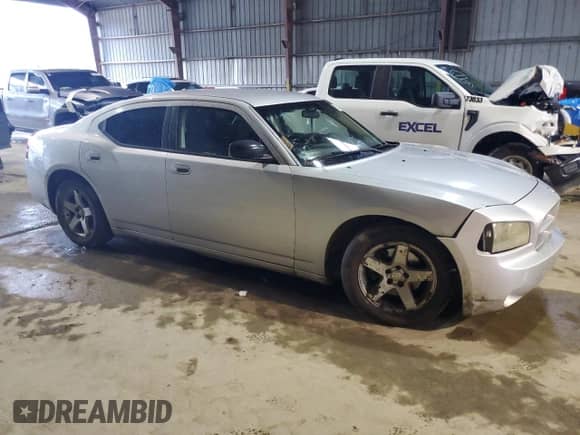 2009 Dodge Charger SE с VIN 2B3KA43D49H589317, выставлен на аукционе Copart как лот 80247764 с пробегом 183 337 миль миль и Списание • Salvage title. История ставок и продаж доступна на DreamBid. Изображение 4.