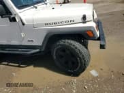 ✅ 2003 Jeep Wrangler Rubicon • VIN: 1J4FA69S73P333199 • Lot: 50602615. Listed on Copart with 133,254 mi. Free auction sales archive from the USA and detailed vehicle history report at DreamBid. Image 10.