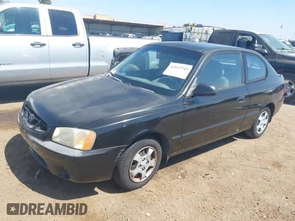 2001 Hyundai Accent GS with VIN KMHCG35C01U114597, listed as a IAAI auction lot 42163745 with 203,310 mi miles and . Bid and sale history available at DreamBid. Image 2.