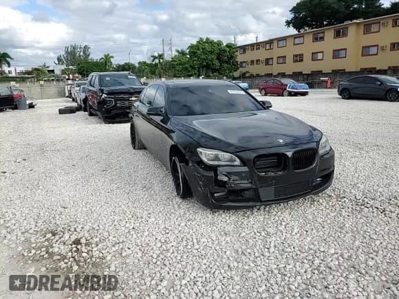 ✅ 2015 BMW 7 Series 750Li xDrive • VIN: WBAYF8C54FD655106 • Lot: 87208835. Listed on Copart with 137,821 mi. Free auction sales archive from the USA and detailed vehicle history report at DreamBid. Image 14.