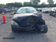 ✅ 2004 Ford Taurus SE • VIN: 1FAFP53284G179777 • Lot: 43053159. Wystawiony na IAAI z przebiegiem Nie podano. Bezpłatny archiwum sprzedaży aukcyjnych z USA i szczegółowy raport historii pojazdu na DreamBid. Zdjęcie 13.