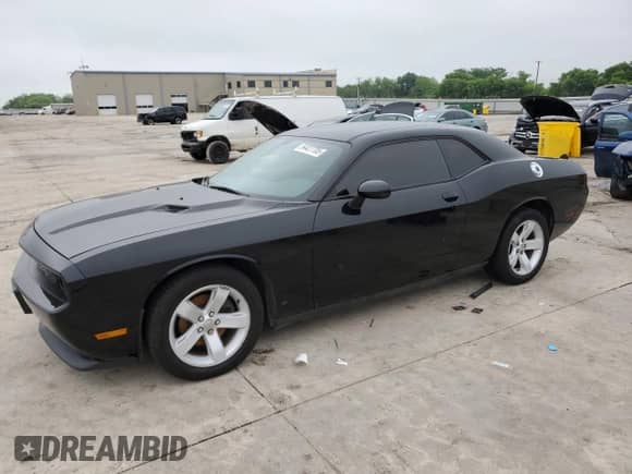 2014 Dodge Challenger SXT 100th Anniversary z VIN 2C3CDYAG9EH231854, wystawiony jako Copart lot #54427705 z przebiegiem 211 763 mil mil oraz Czysty tytuł • Clean title. Historia ofert i sprzedaży dostępna na DreamBid. Obrazek 1.